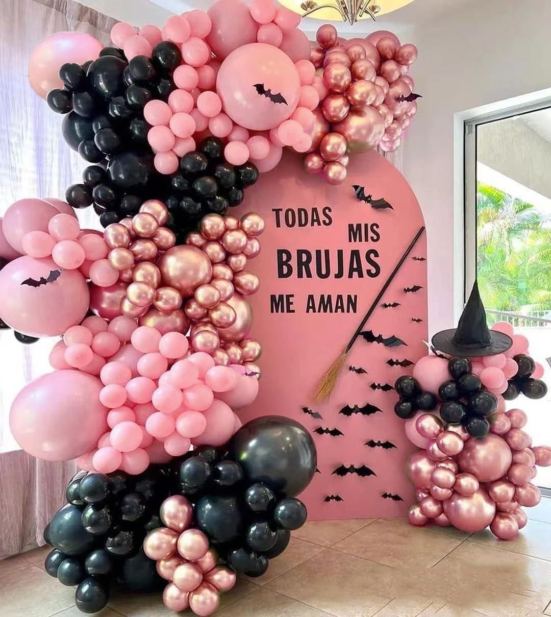 Pink balloon photo backdrop for birthday event